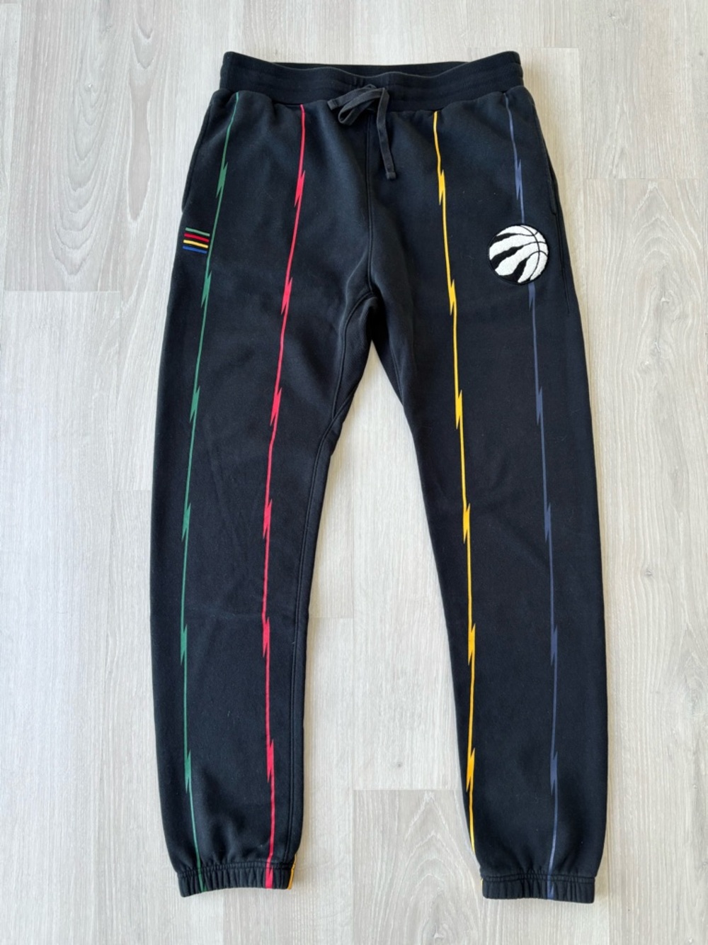 NBA & the Bay Black Sweatpants with Green Red Yellow and Navy Stripe Accents